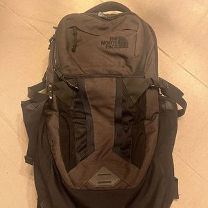 North Face Grey and Black Backpack , No visible Defects barely used.